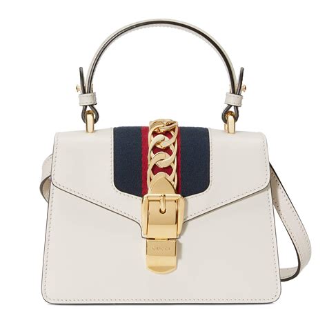 gucci sylvie super mini white|Gucci mini sylvie top handle bag.